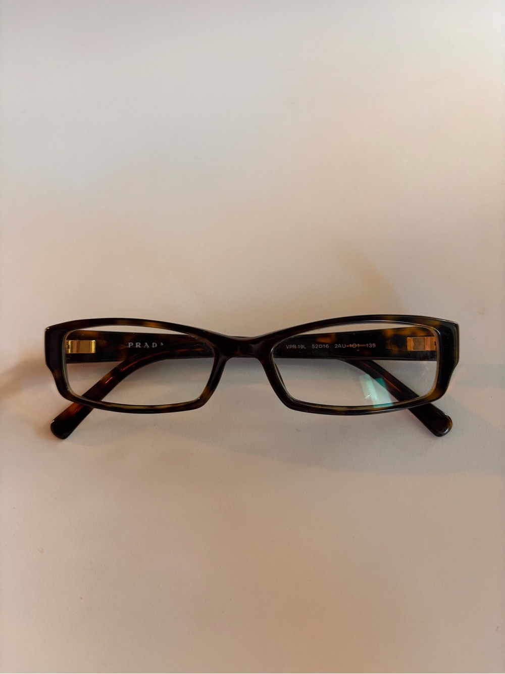 Prada glasses in tortiose